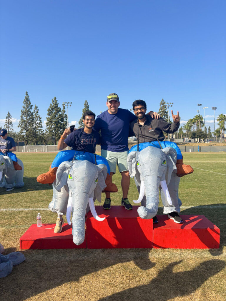 ASI participants of the elephant race pose together while dressed in elephant inflatables 