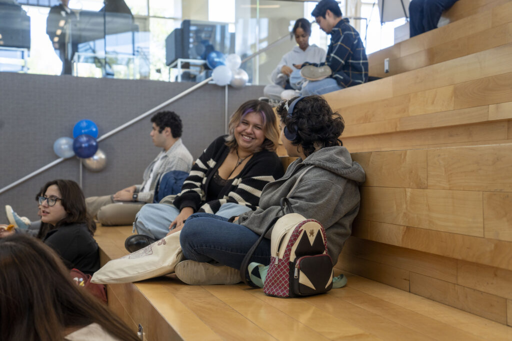 Two women interact with each other at ASI community Chat event.