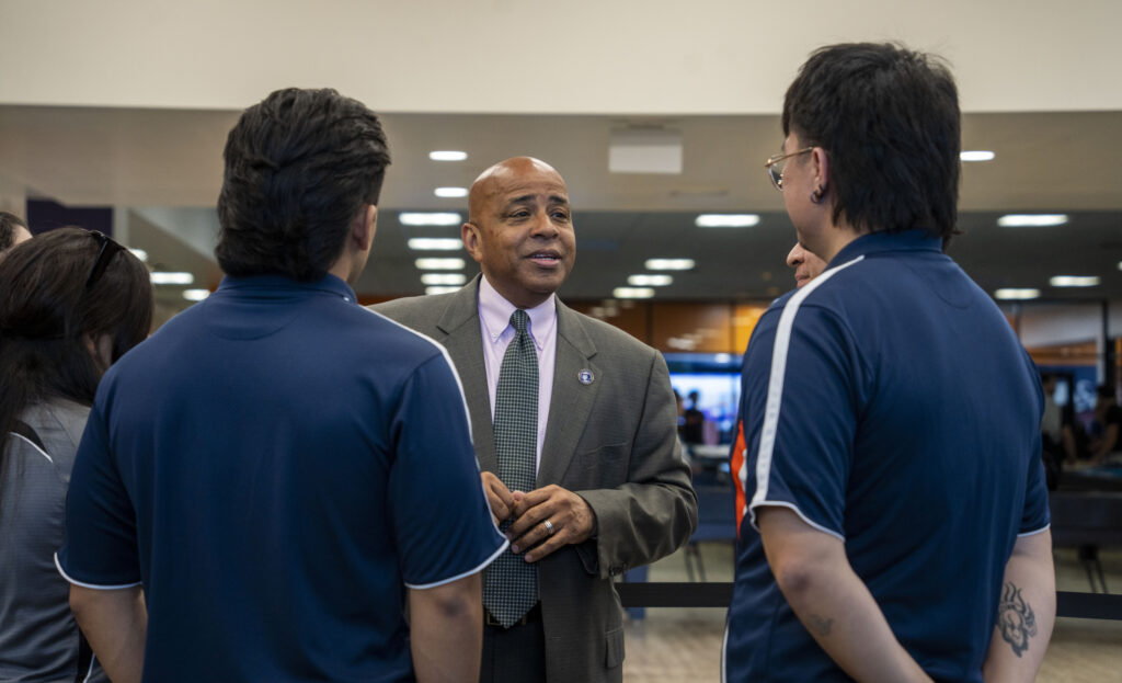 President Rochon chats with ASI board leaders after the Community Chat. 