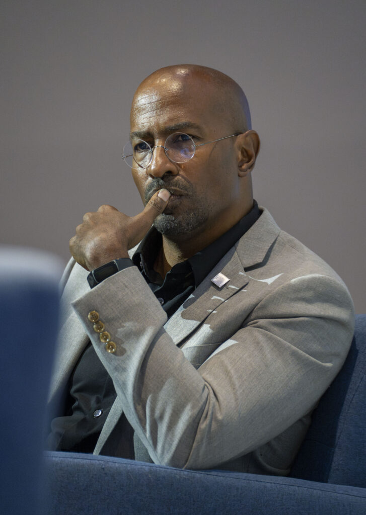 Van Jones close up listening to the interviewer ask questions