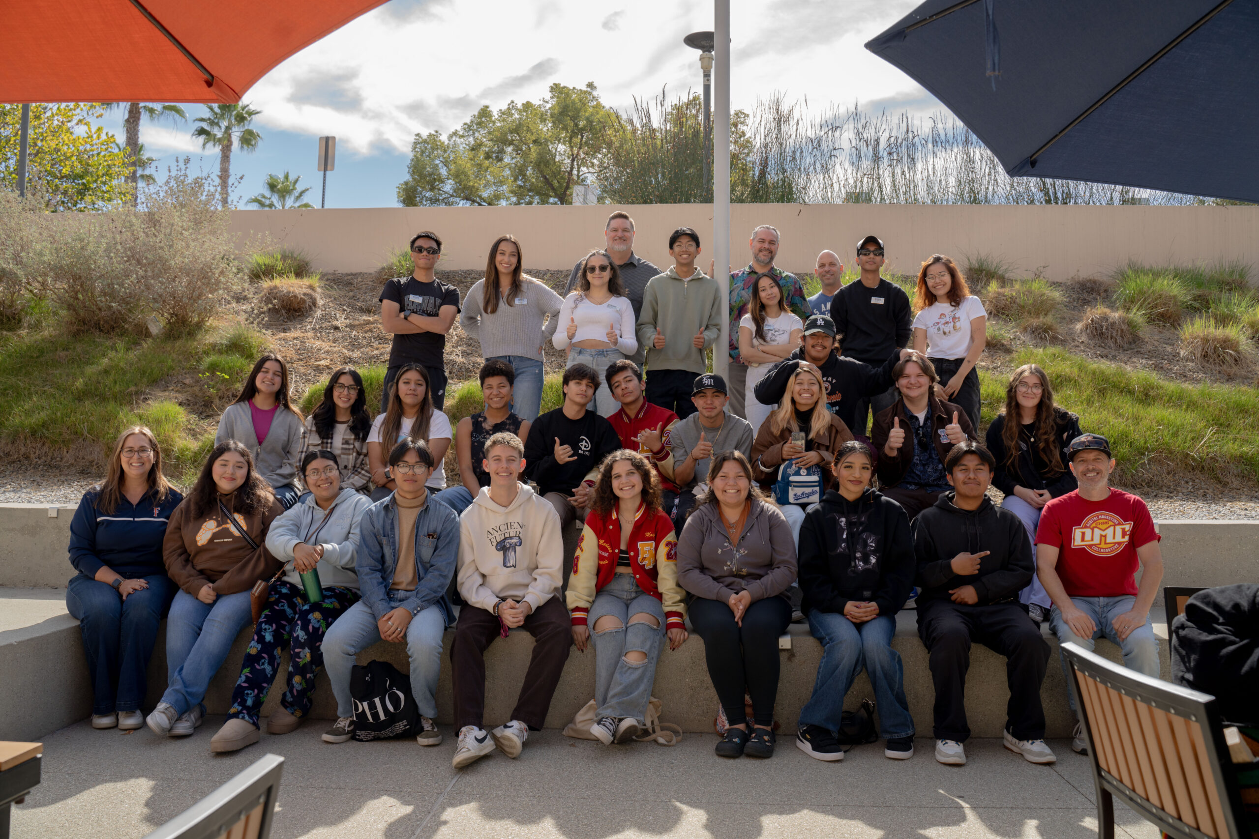 The students of El Modena High School's Digital Marketing Collaborative posing for a group photo with ASI's student assistants.