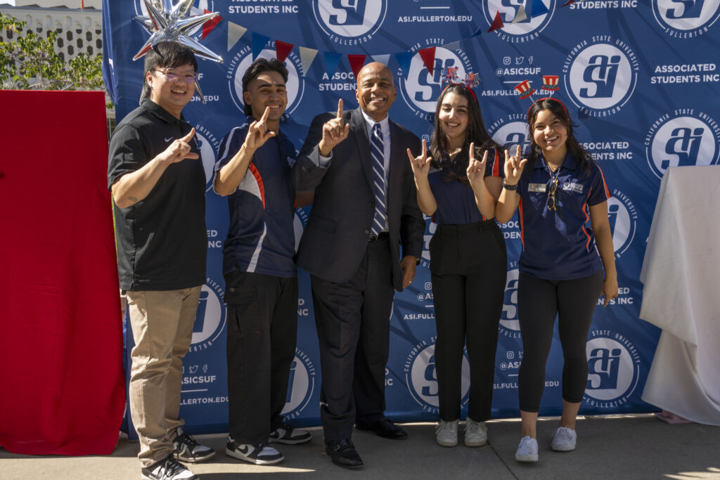 ASI student leaders pose for a picture with President Rochon