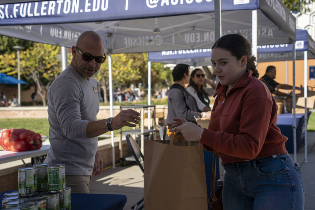 ASI Marketing staff volunteer at the Food Pantry pop-up 