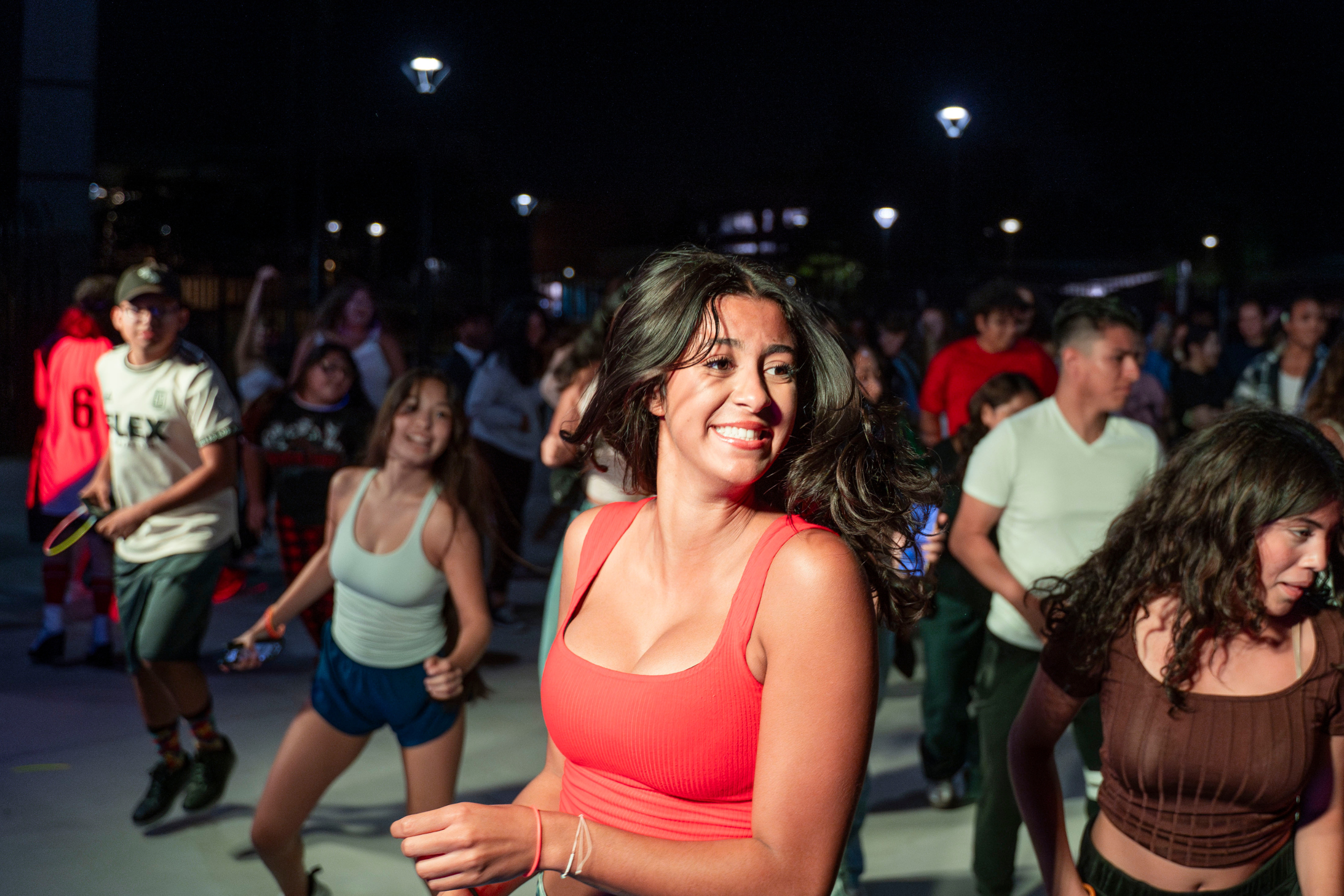 a girl dancing and smiling