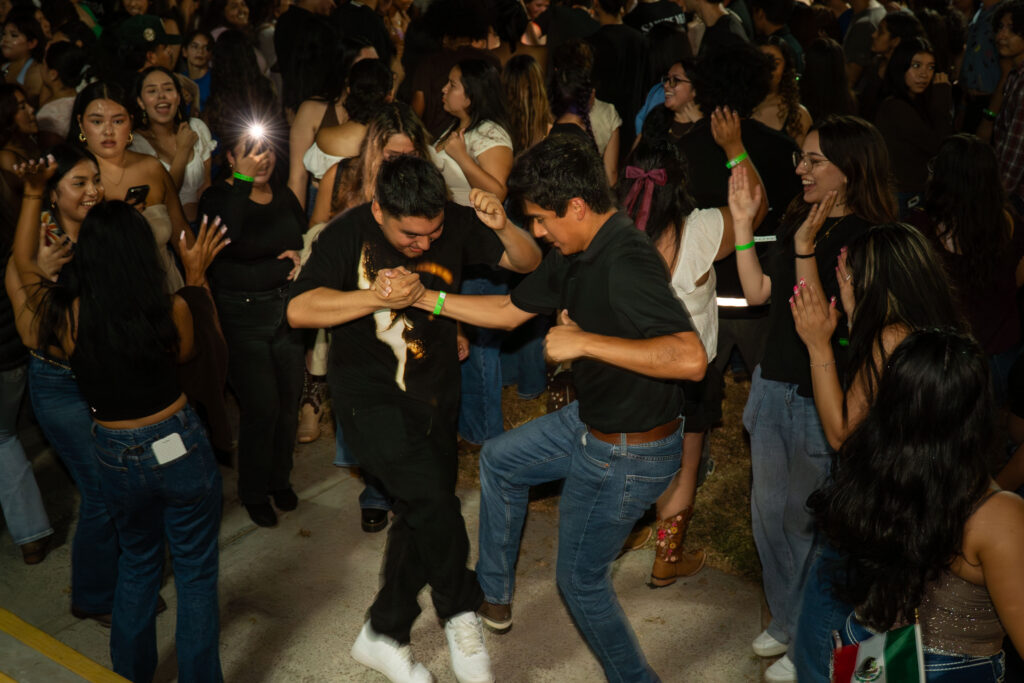 two guys dance in a circle