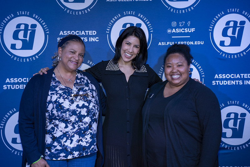 two asi staff members with actress Stephanie Beatriz