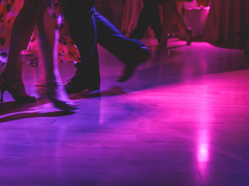 a flourescent picture of people dancing