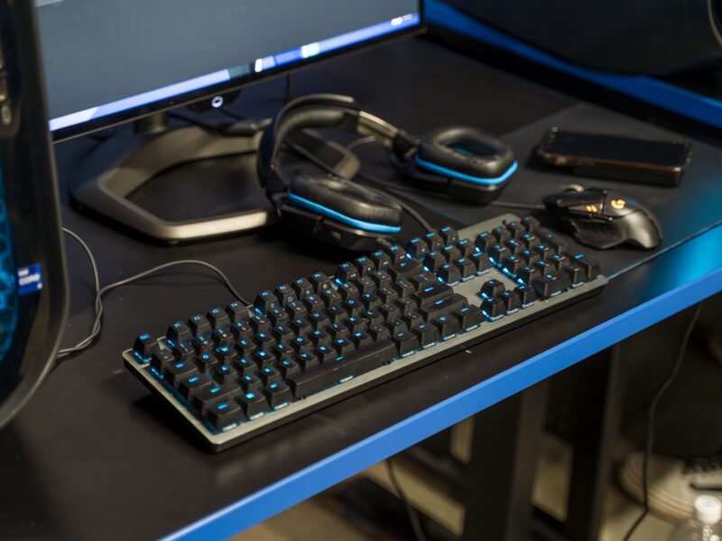 a black keyboard sits on a computer