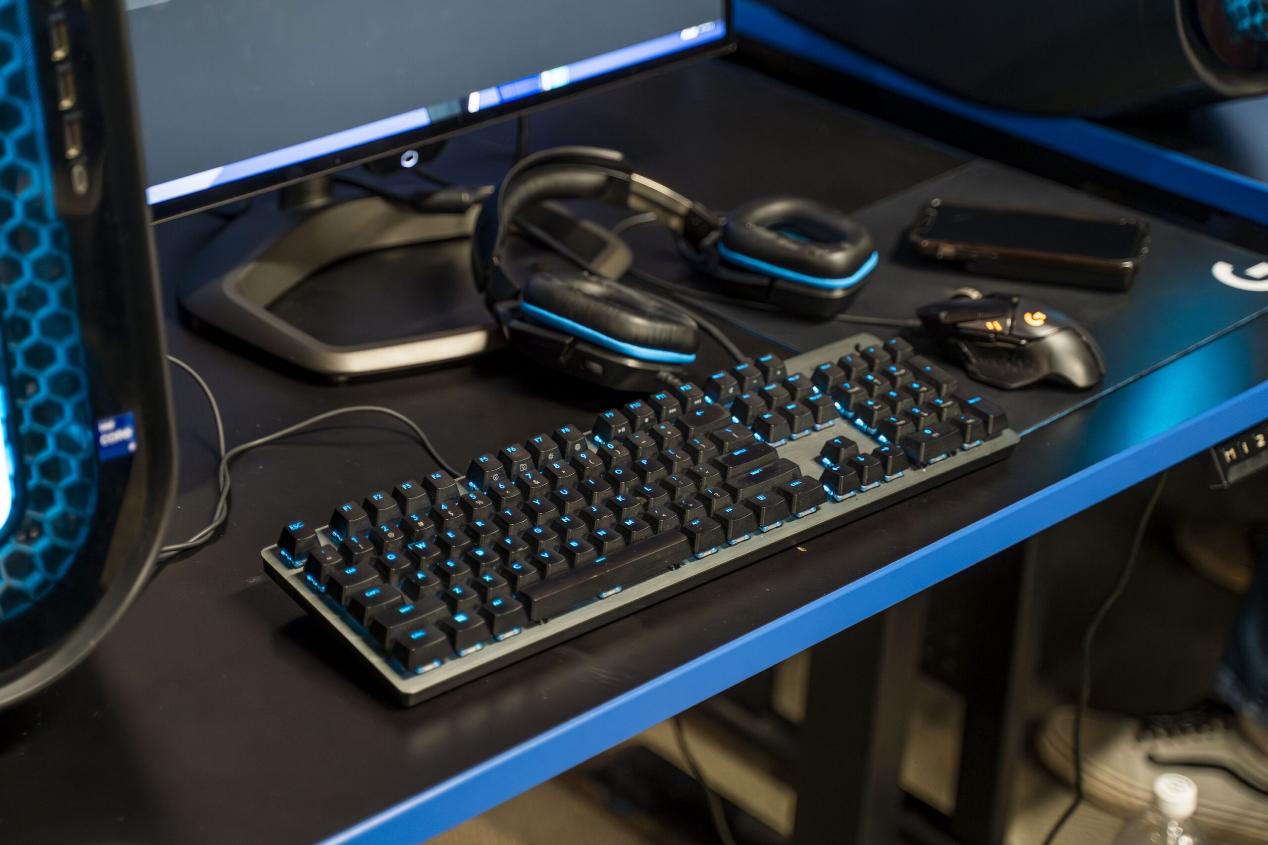 a black keyboard sits on a computer