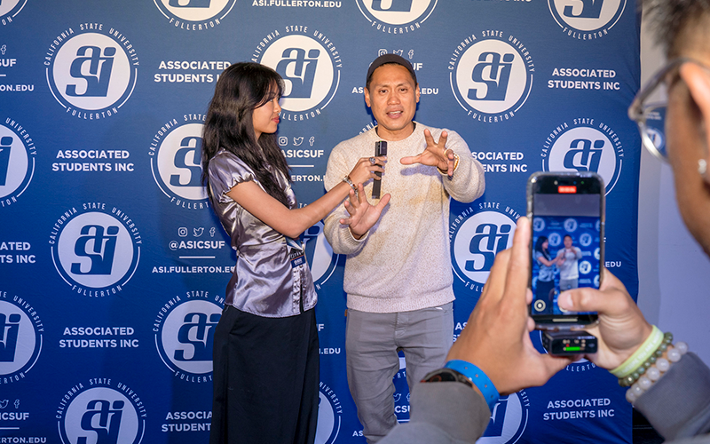 student employee interviews director Jon M. Chu