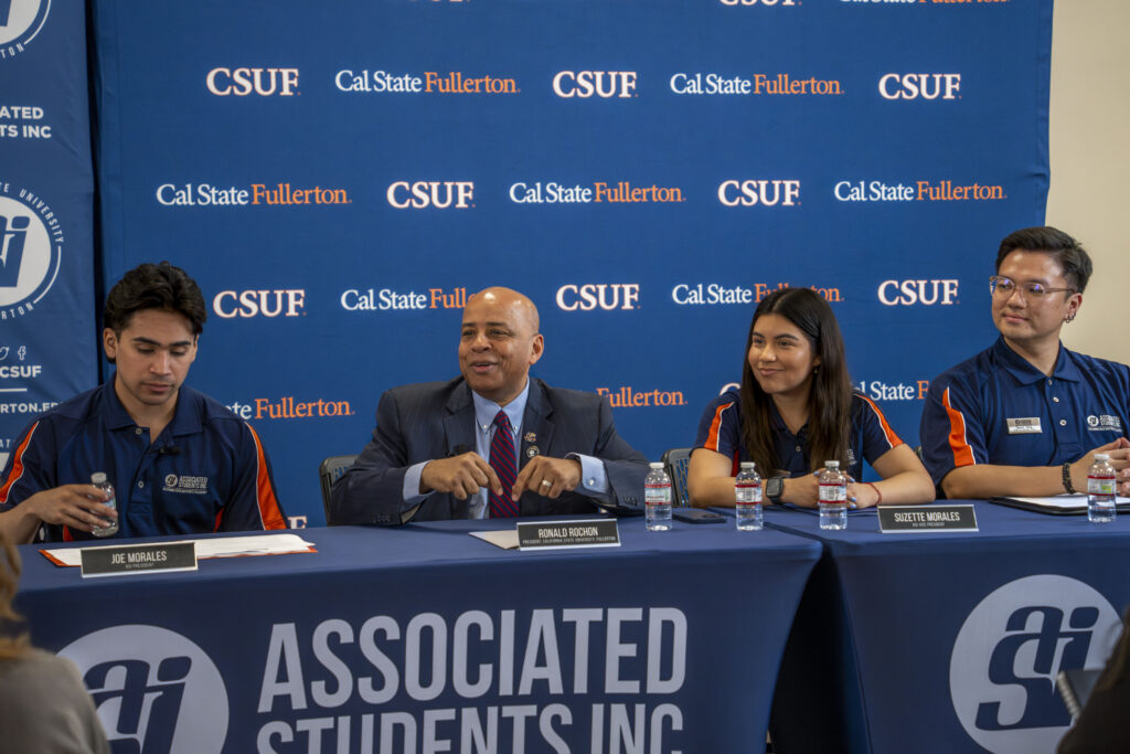 a group of people lining a table