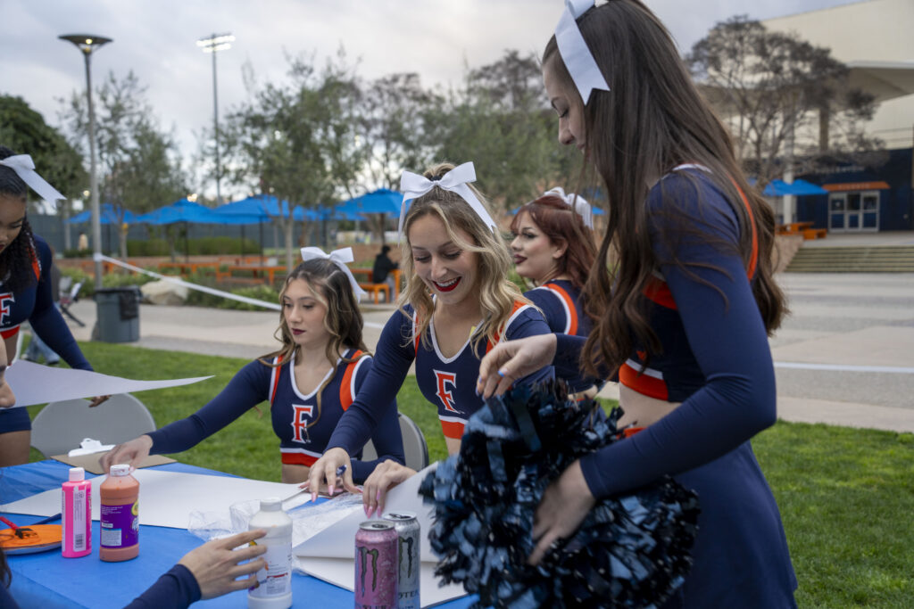 a group of cheerleaders smiling