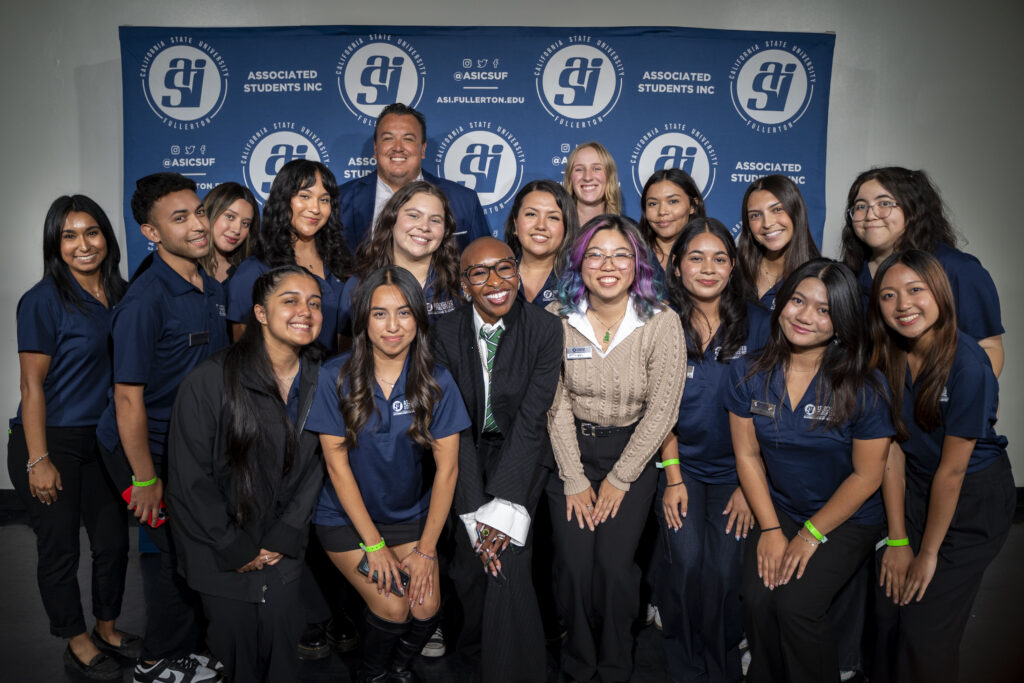a group of students posing with Cynthia Erivo