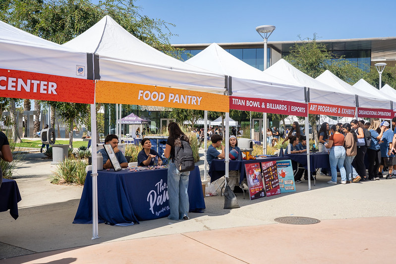 54774715775_772781056b_c ASI Resource Fair tables and tents