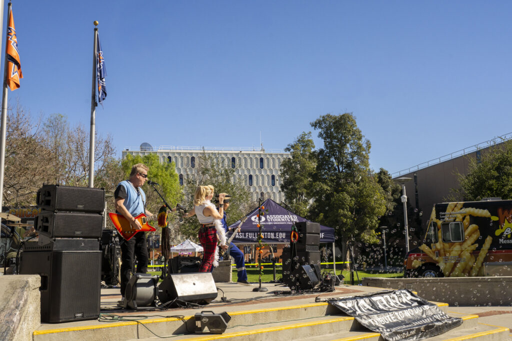 a no doubt tribute band performs at the becker amphitheater on campus 