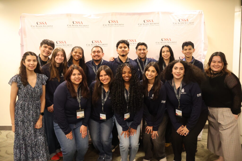 a group of students pose together for a picture 