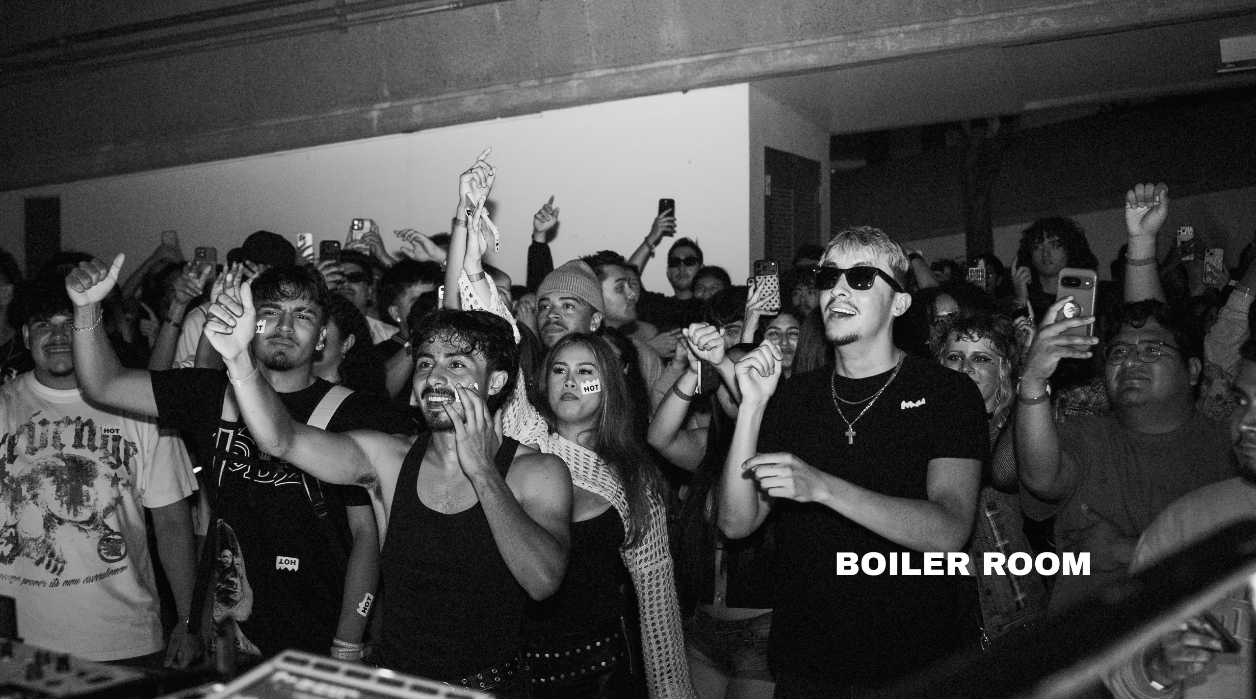 black and white image of people at a concert