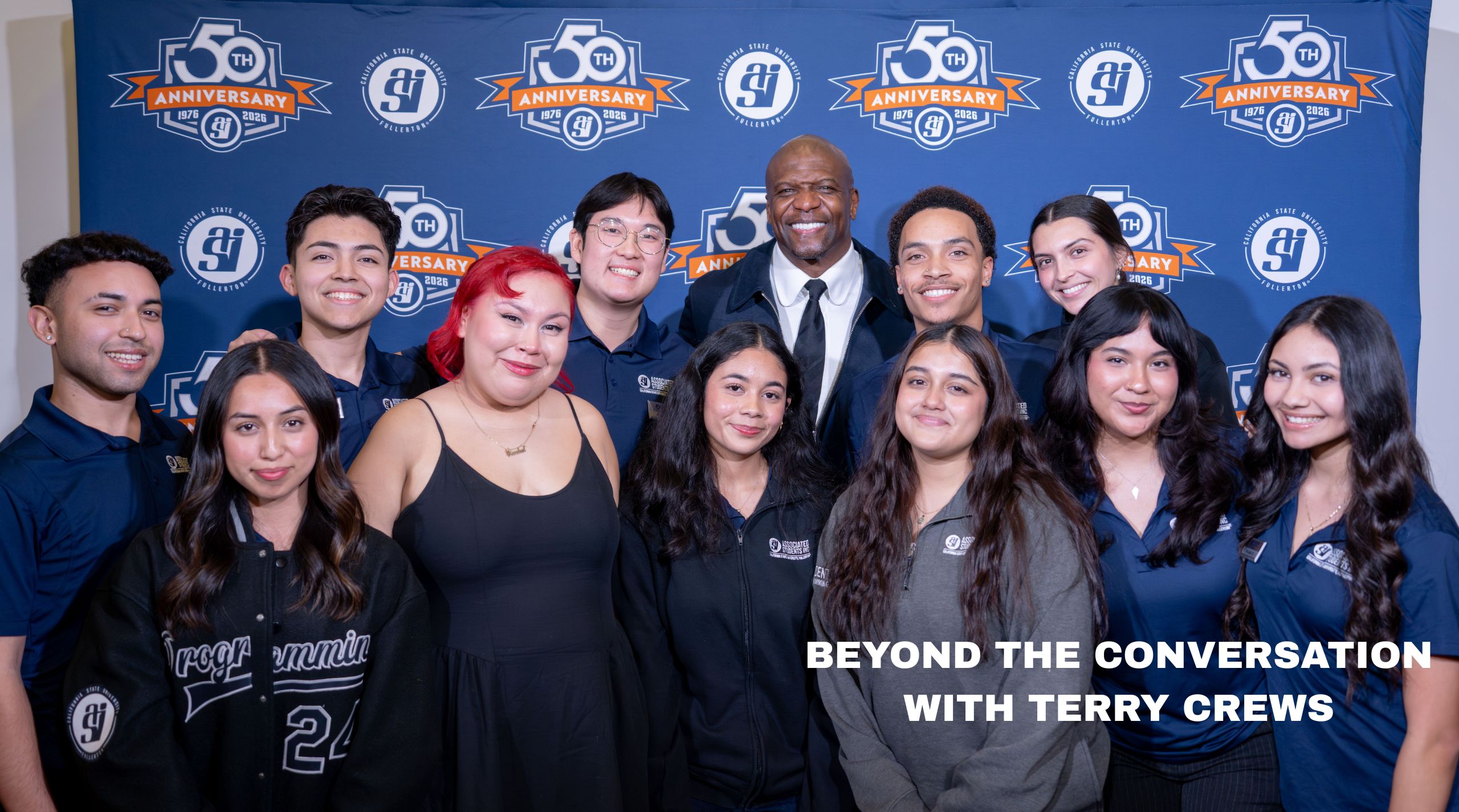 a group of people posing for a picture with Terry Crews